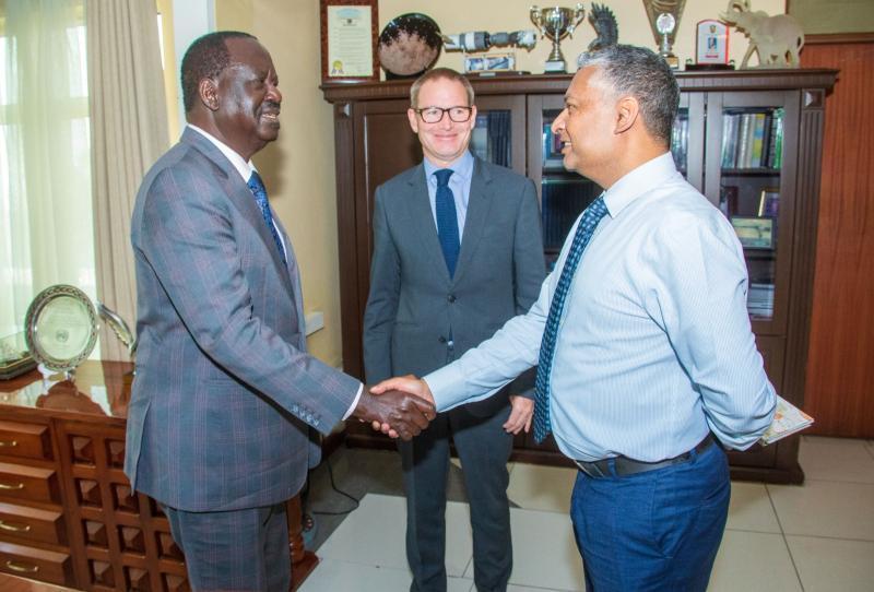 Raila Odinga with Uk High Commissioner to Kenya Neil Wigan.